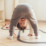 kid-playing-with-toy-train Warm up Time Babies